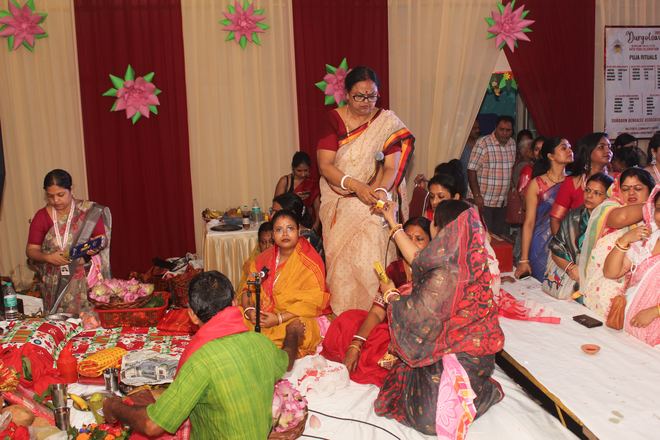 Puja rituals being performed on stage