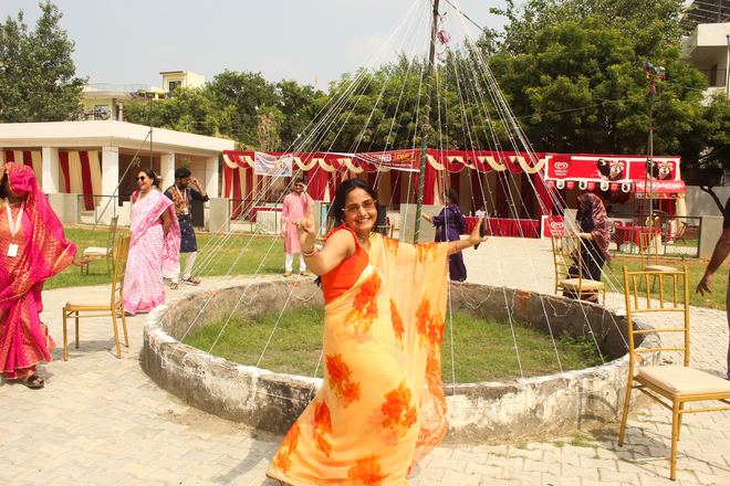 Member celebrating at the Puja grounds