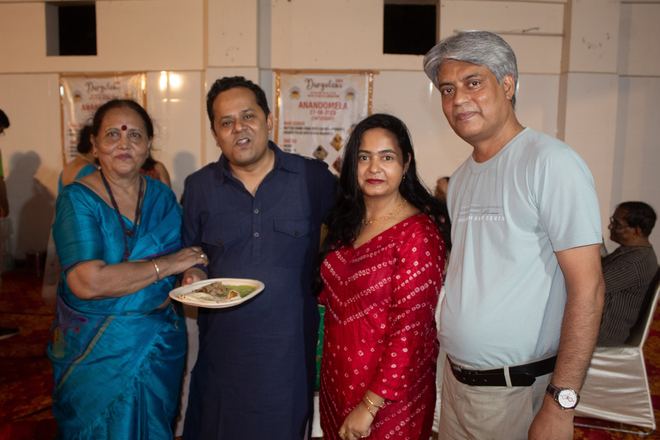 Committee members with guests at Anandomela