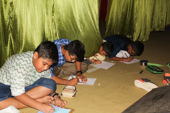 Children drawing during a cultural activity