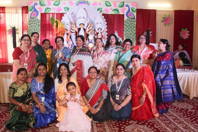 Community group photo with the Durga idol